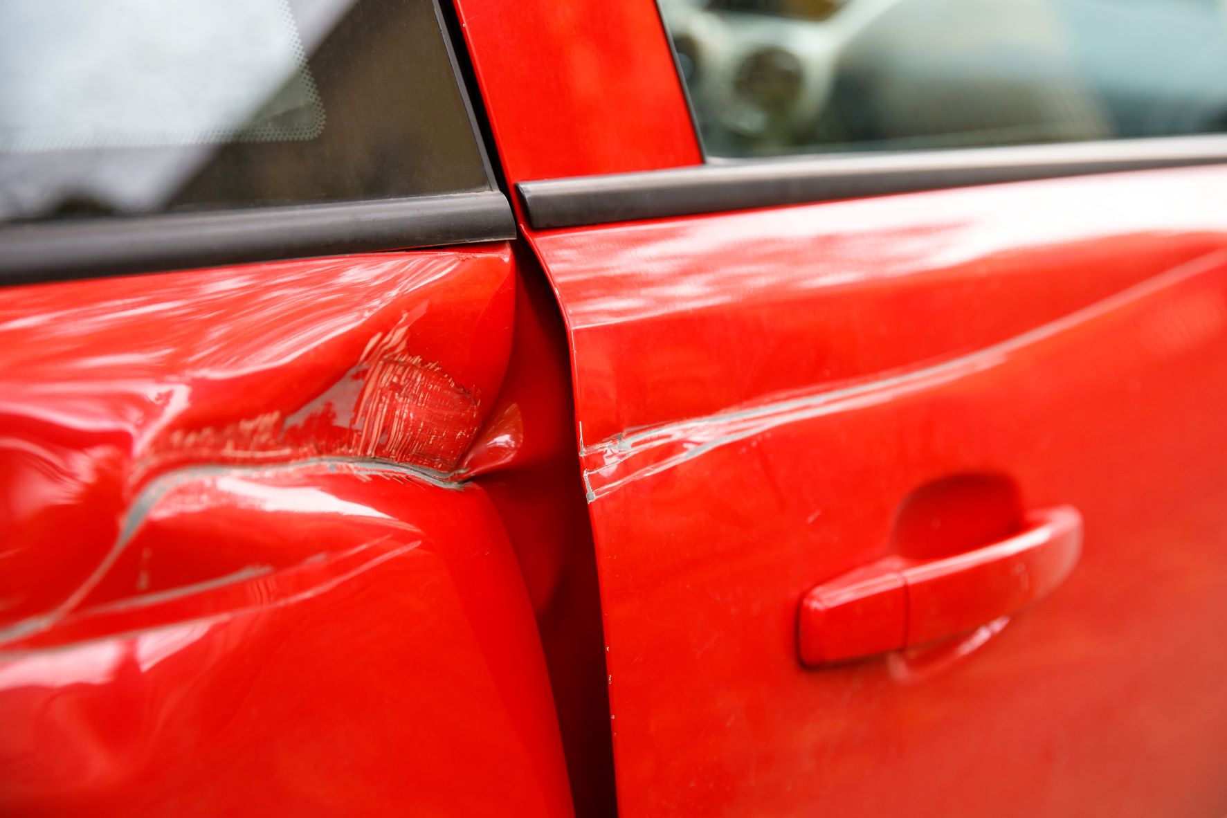 What Causes Car Dents and Scratches?